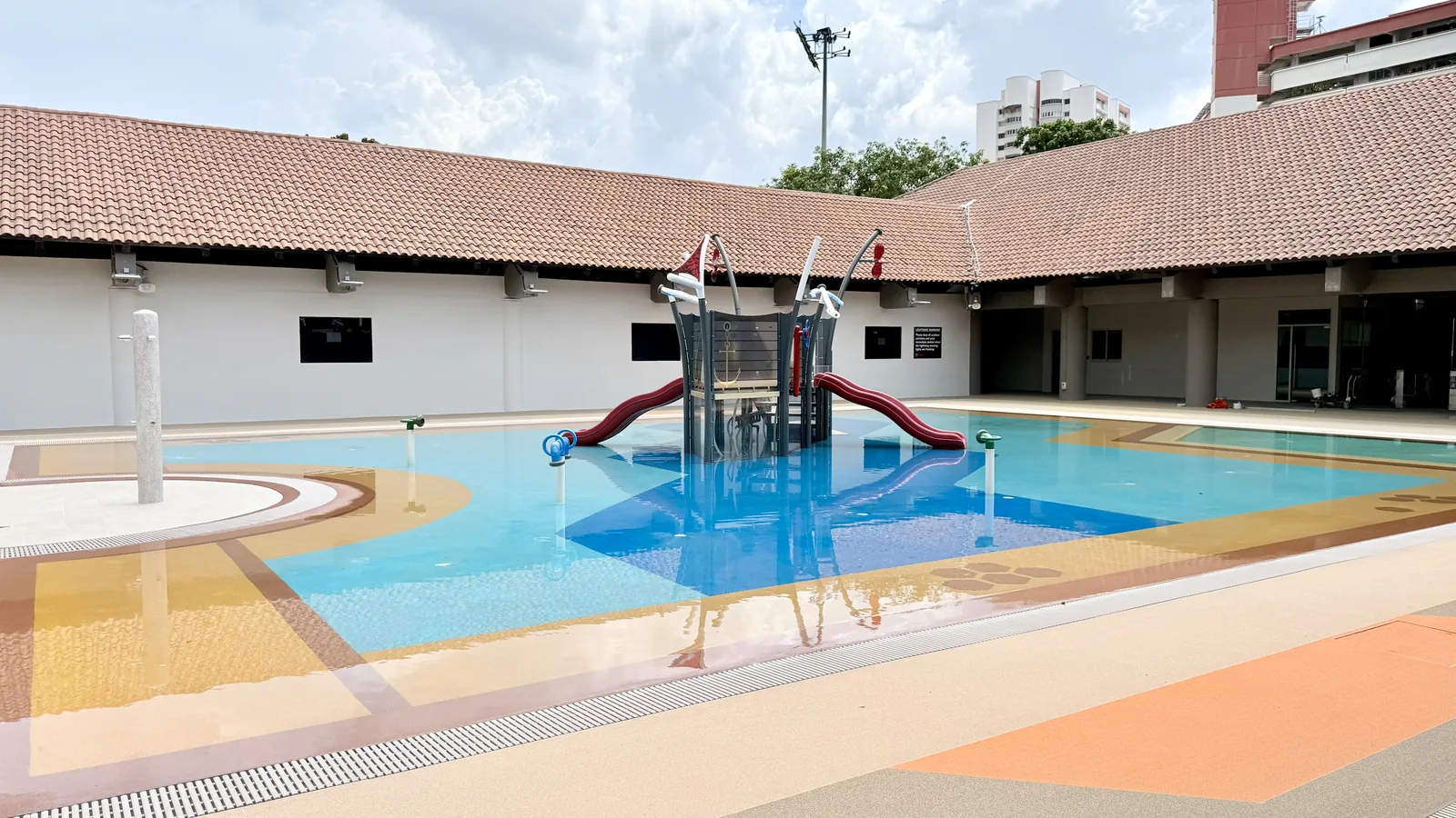 Children's wading pool with water play features at Hougang Swimming Complex